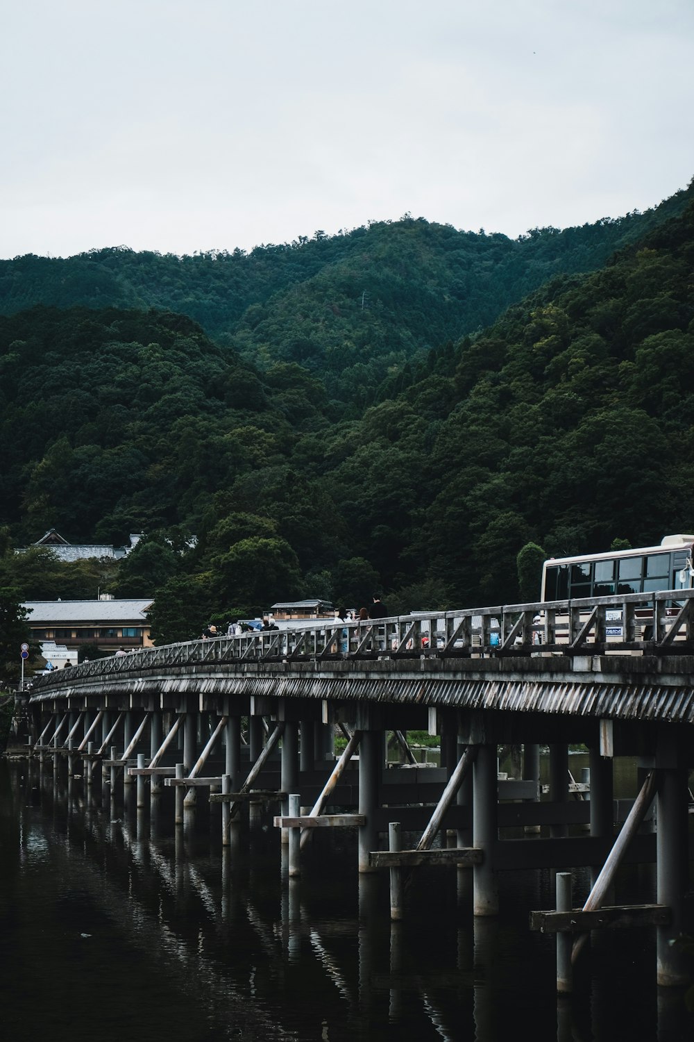 gray concrete bridge over river