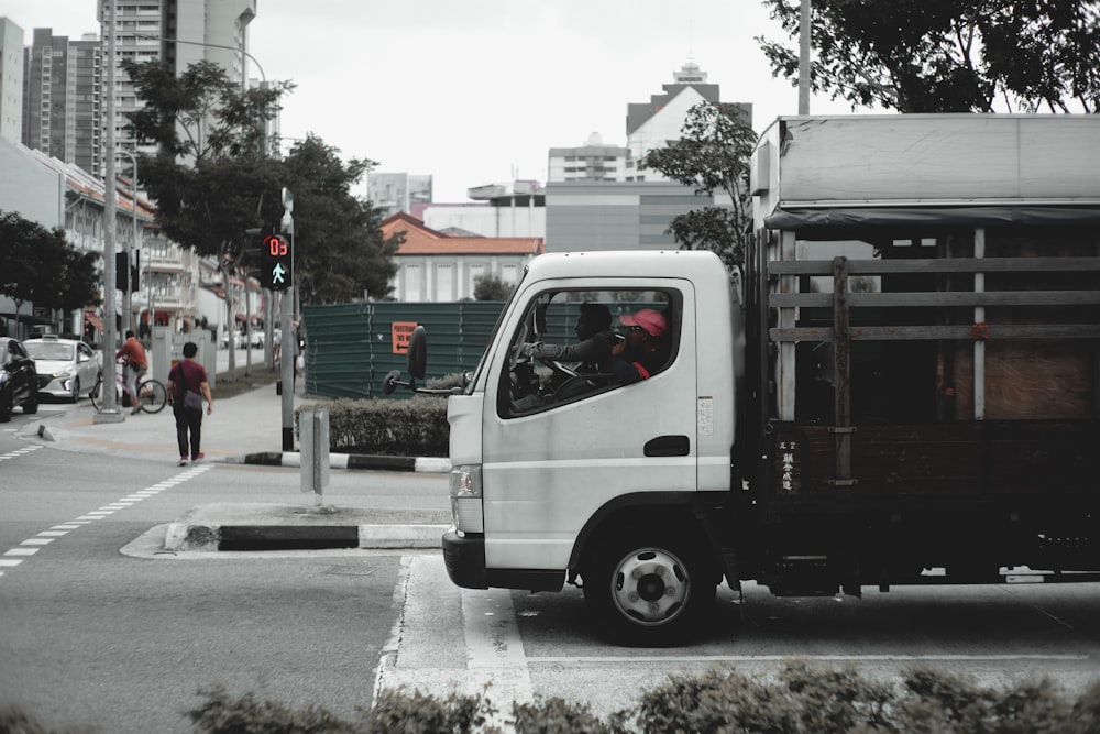 white van on road during daytime