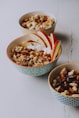 white and green ceramic bowl with food