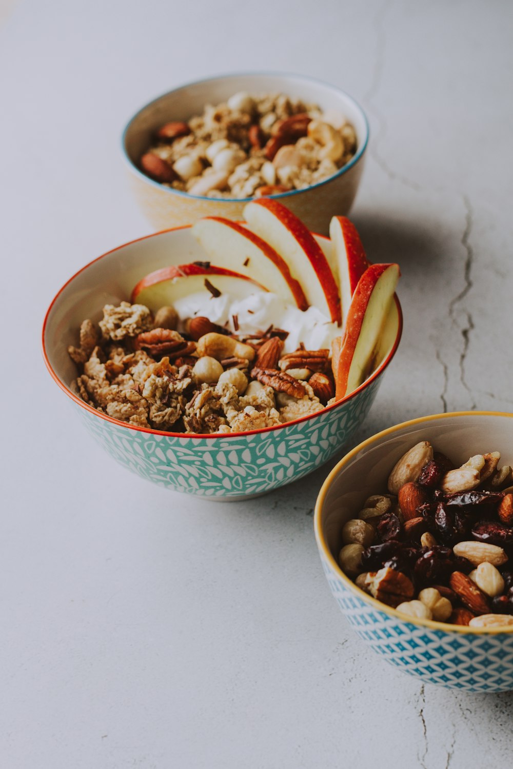 white and green ceramic bowl with food