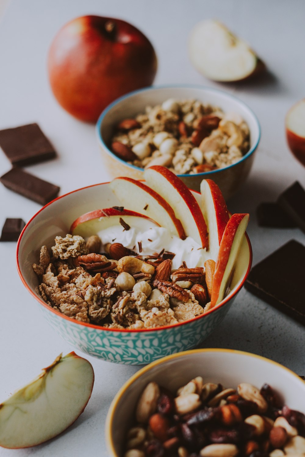 sliced strawberries and nuts in blue ceramic bowl