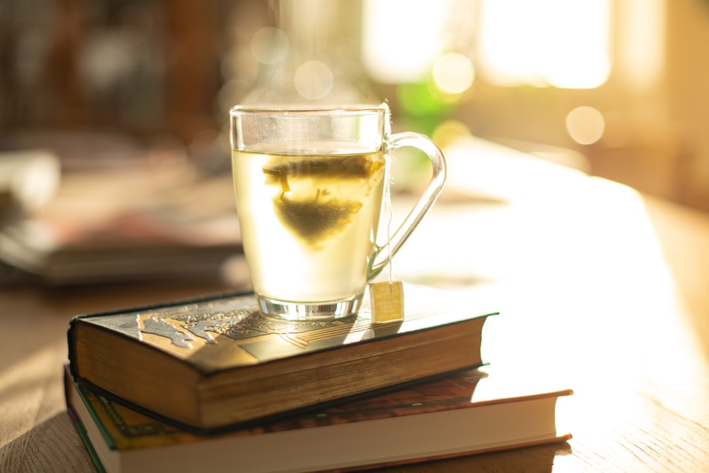 clear glass mug on brown wooden tray