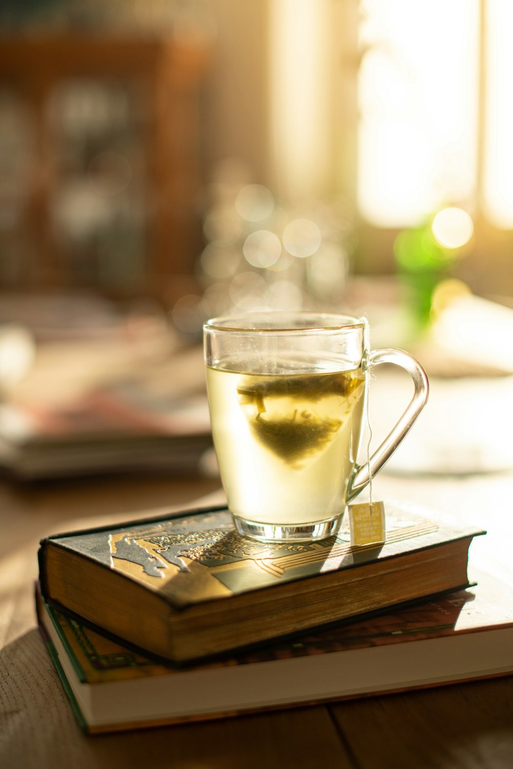 clear glass mug on brown wooden table