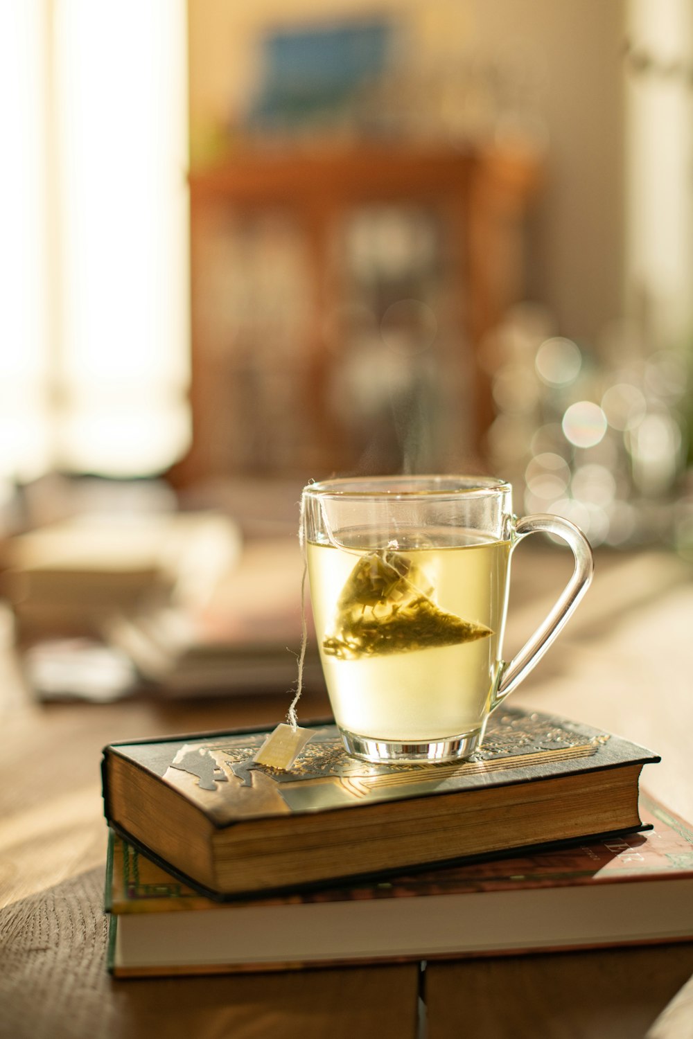 clear glass mug on brown wooden table