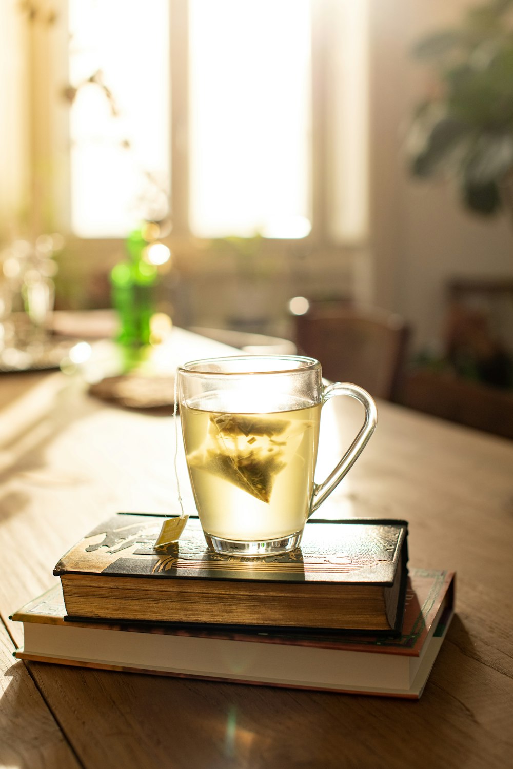clear glass mug on brown wooden table