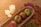 Colorful seasonal trays displayed on a rustic wooden table.