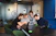 A warm, inviting workspace with a small group engaged in a lively insight training session.