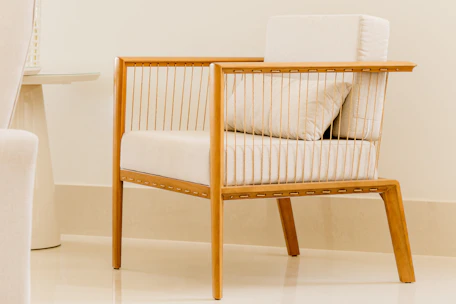 white and brown wooden armchair