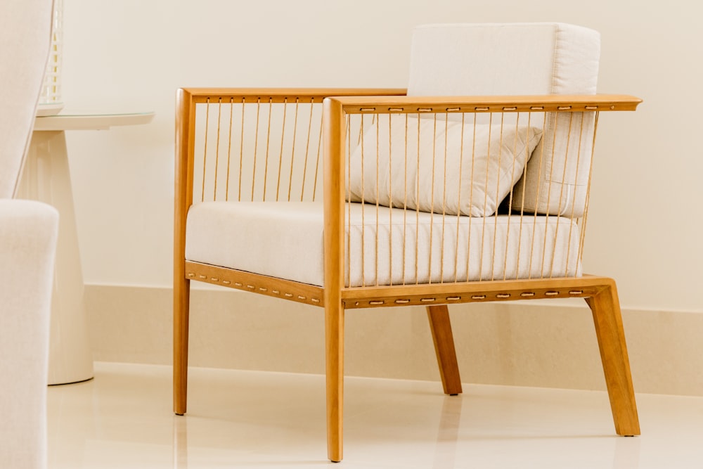 white and brown wooden armchair