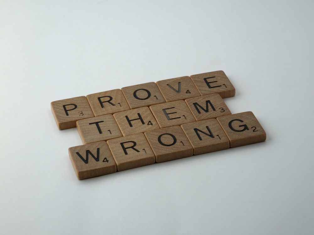 brown wooden blocks on white table