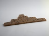brown wooden blocks on white table