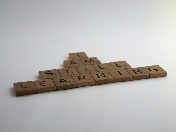 brown wooden blocks on white table