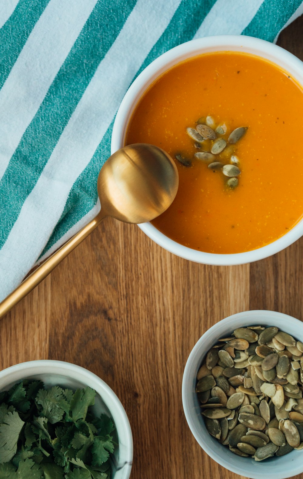 stainless steel spoon on white ceramic bowl