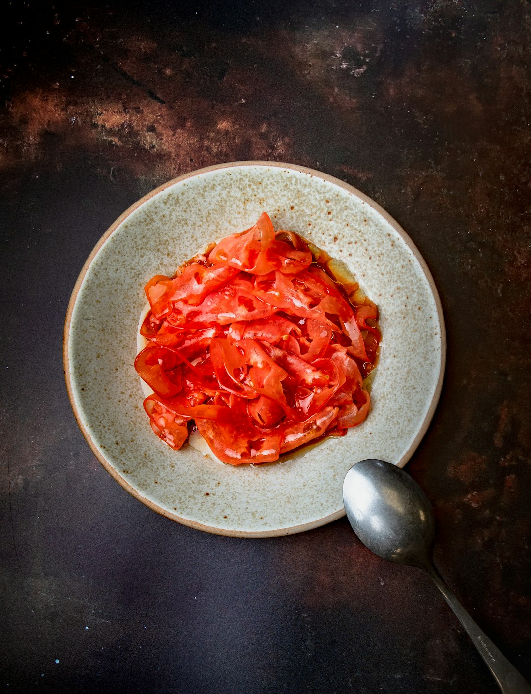 red sauce on white ceramic bowl