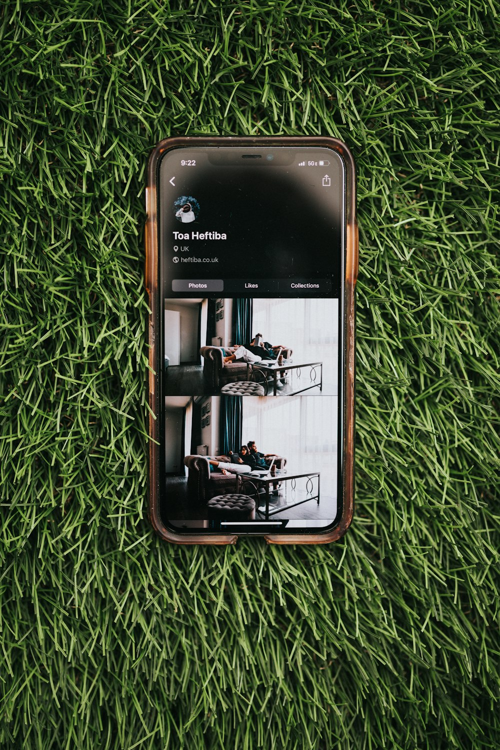 black samsung galaxy smartphone on green grass