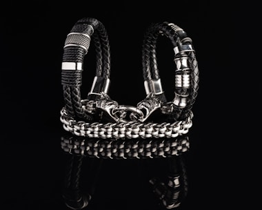 A collection of leather and metal bracelets displayed elegantly.