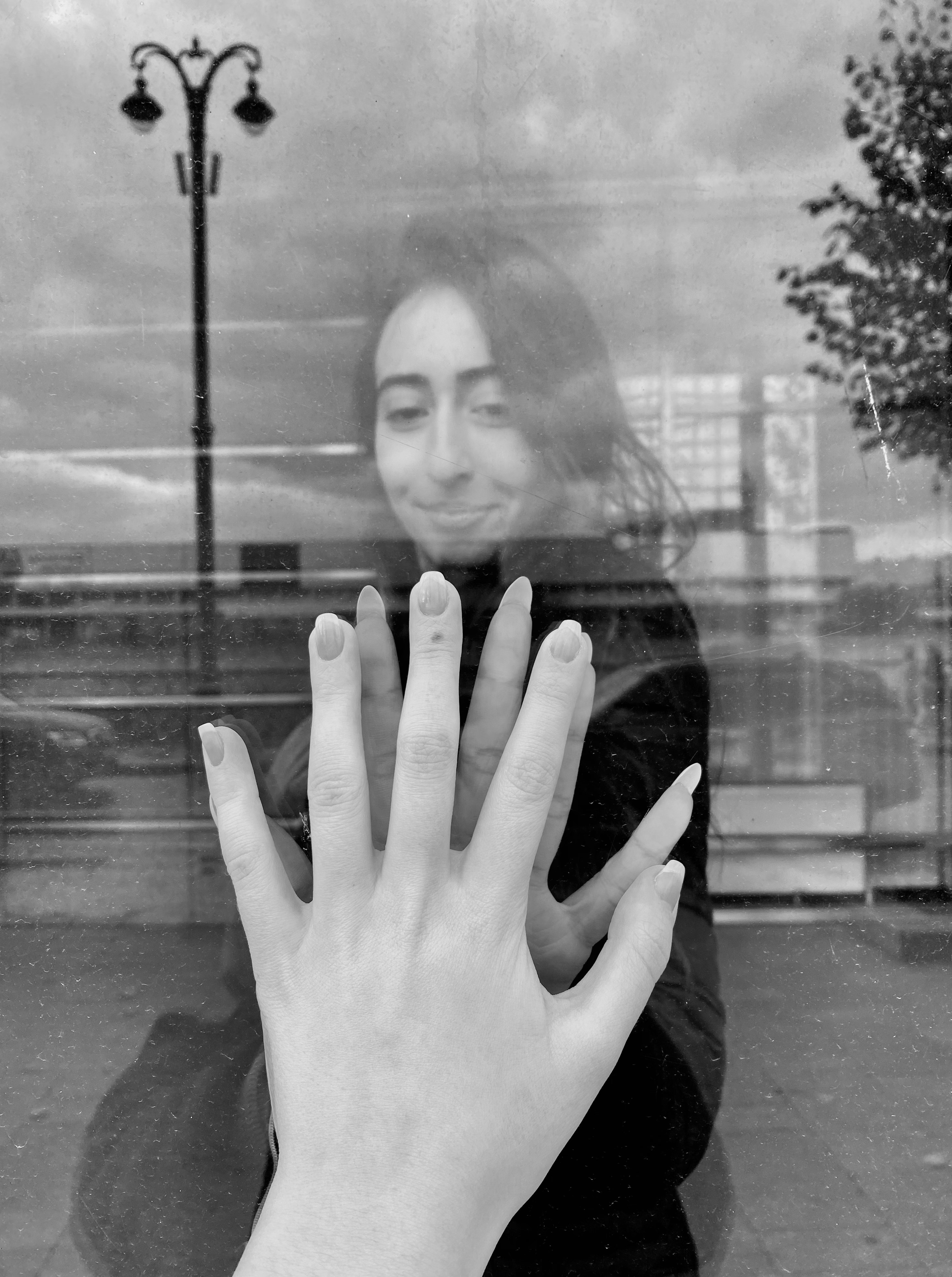 grayscale photo of woman in black long sleeve shirt