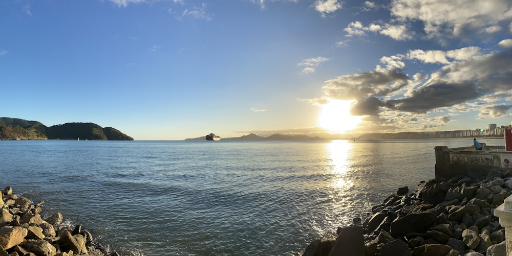 body of water under blue sky during daytime