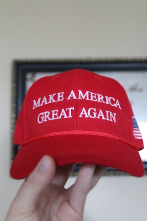 a red hat that says make america great again