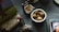 A close-up of a beautifully arranged display of various items on a wooden table.