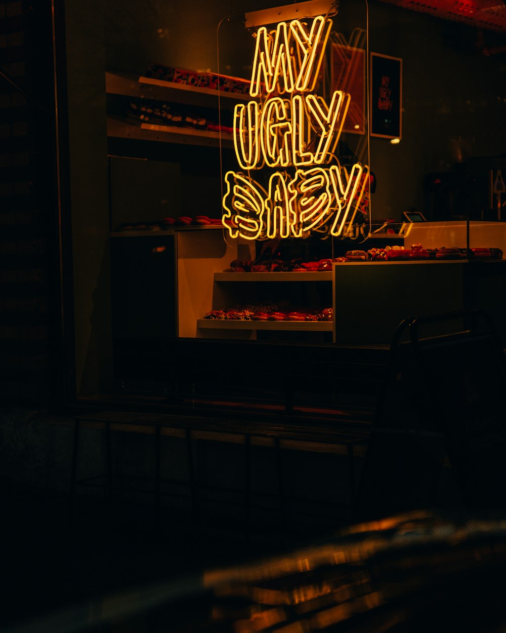 red and yellow neon light signage