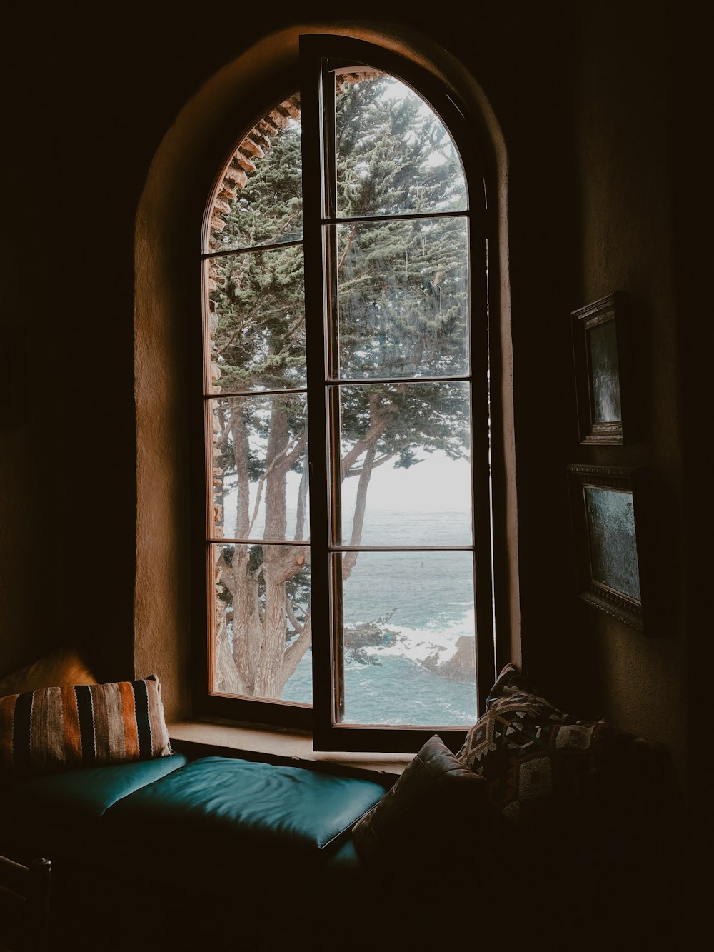 brown wooden framed glass window