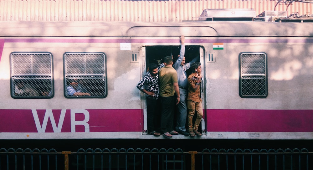 people in train during daytime