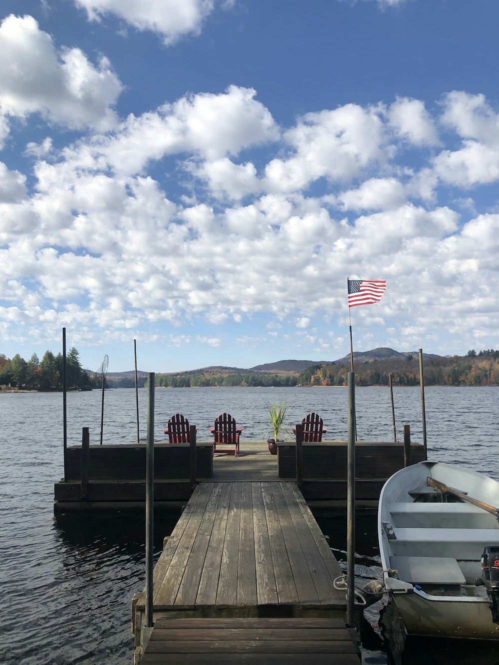 white boat on dock during daytime