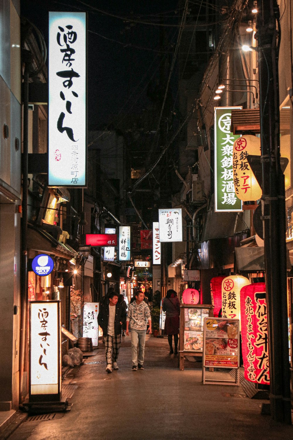 people walking on street during daytime