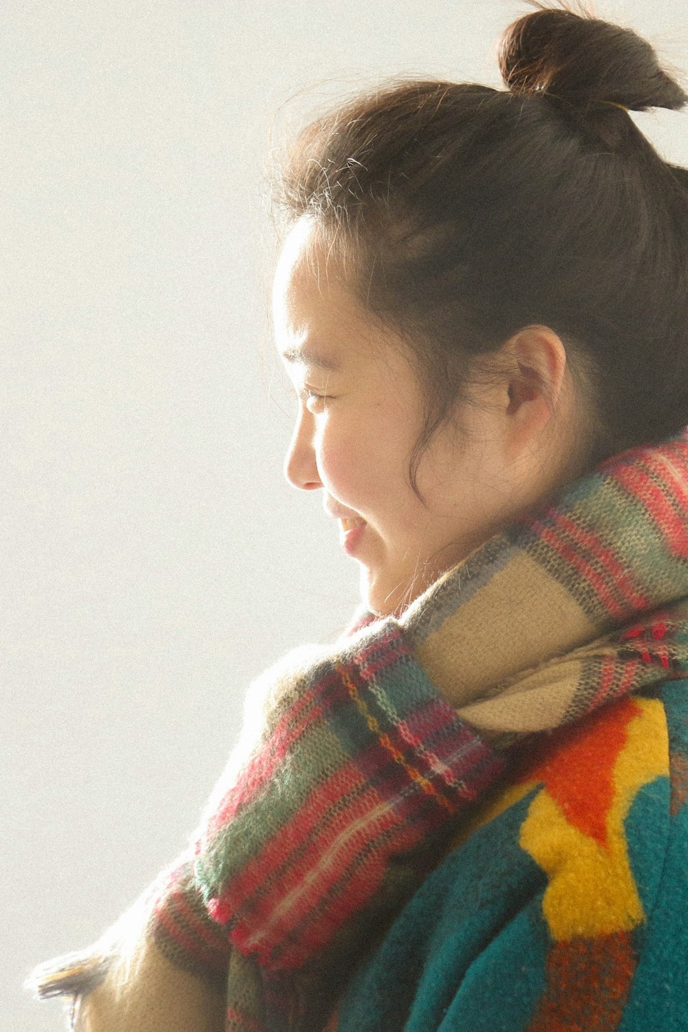 woman in red white and blue scarf