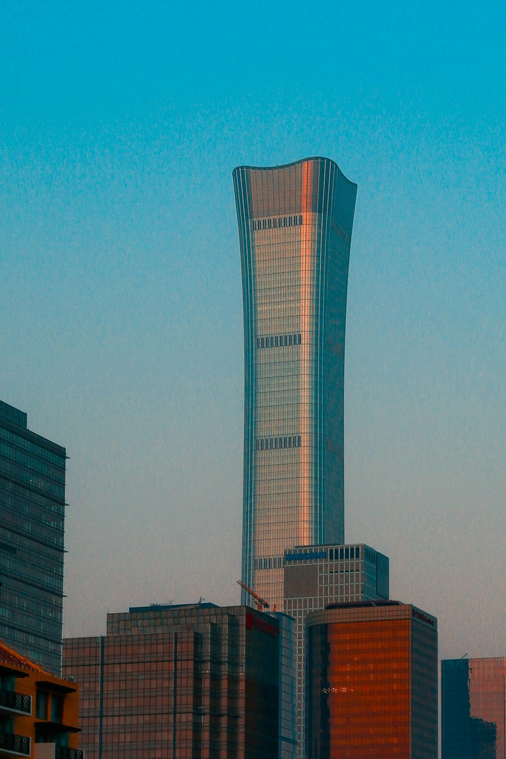 white concrete building under blue sky during daytime