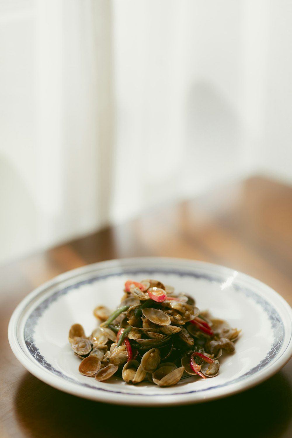 green vegetable on white ceramic plate