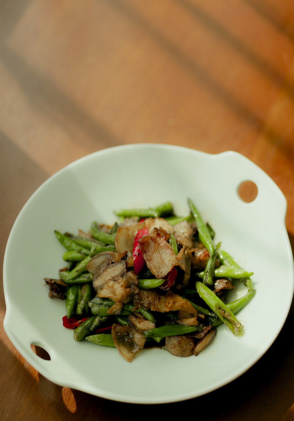 green vegetable dish on white ceramic plate