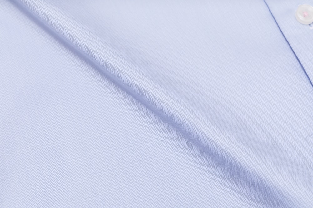 white textile with black line