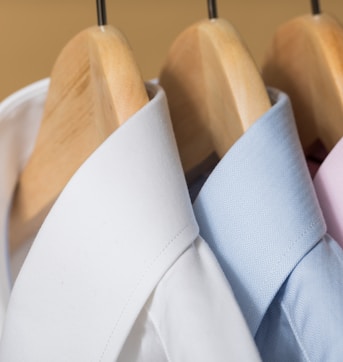 white and purple button up shirt