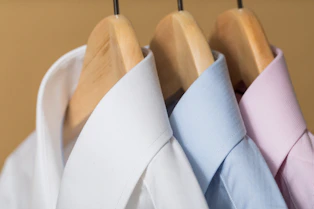 white and purple button up shirt