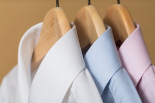 white and purple button up shirt