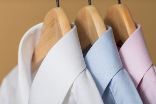 white and purple button up shirt