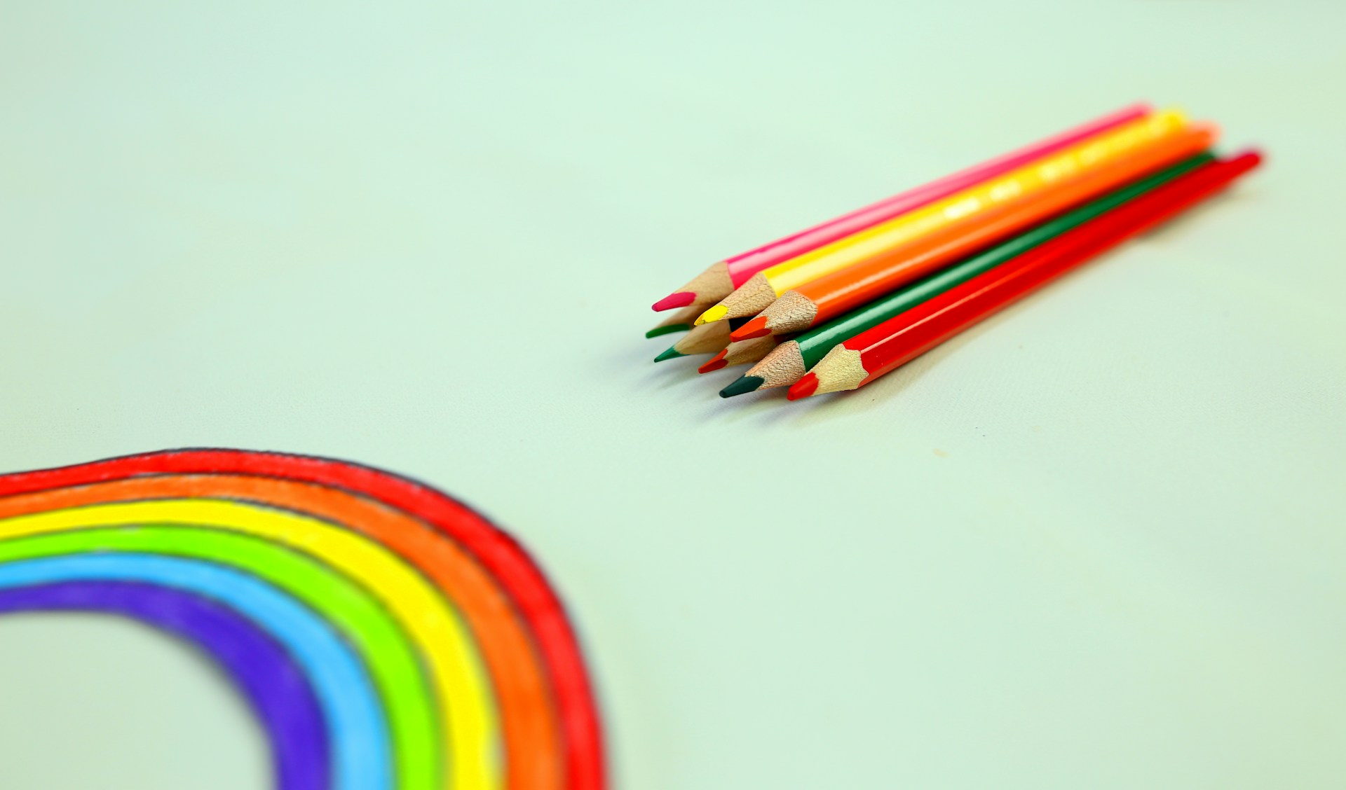multi color pencil on white surface