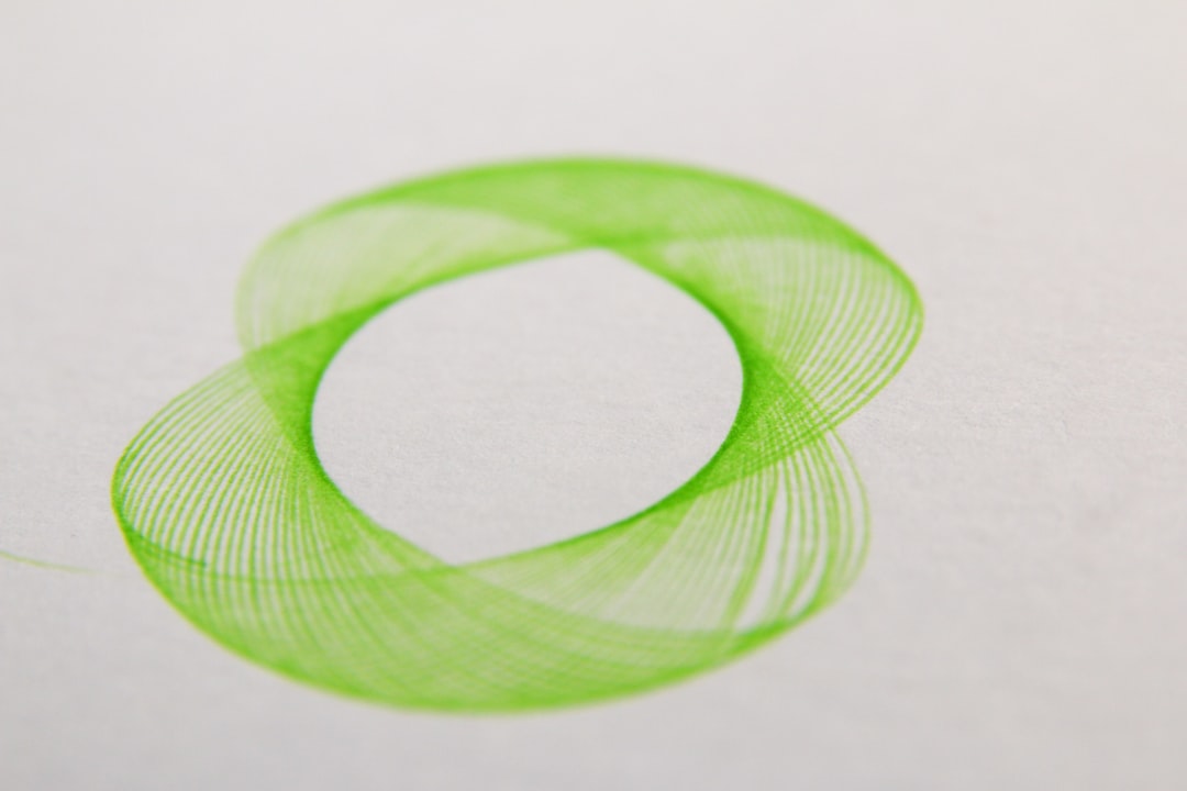 green round paper on white surface