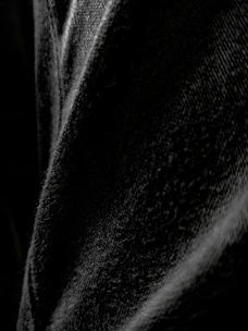 Close-up of leggings fabric showing texture and stretch.