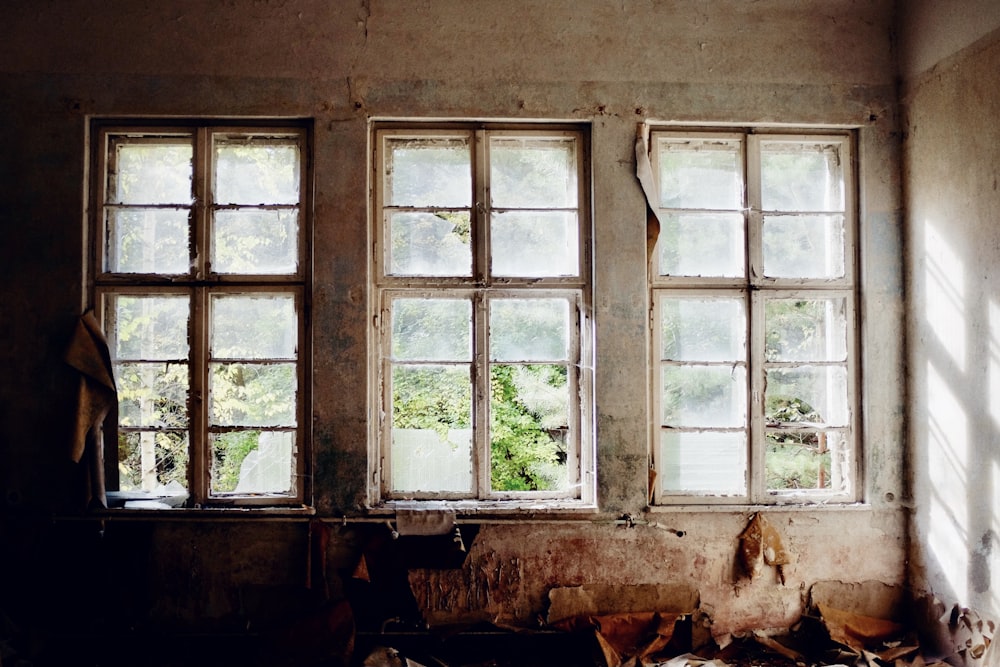 brown wooden framed glass window