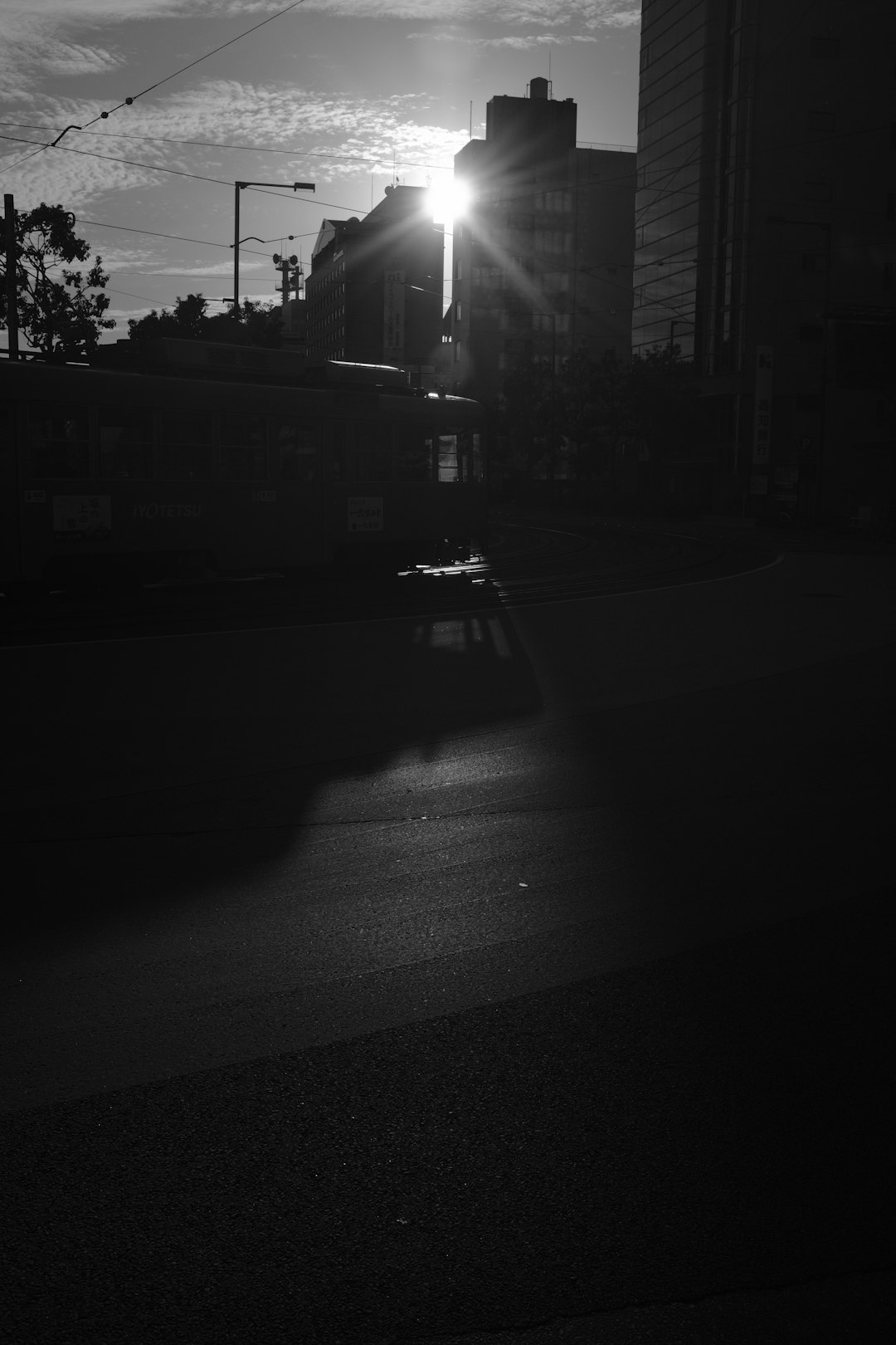 grayscale photo of car on road