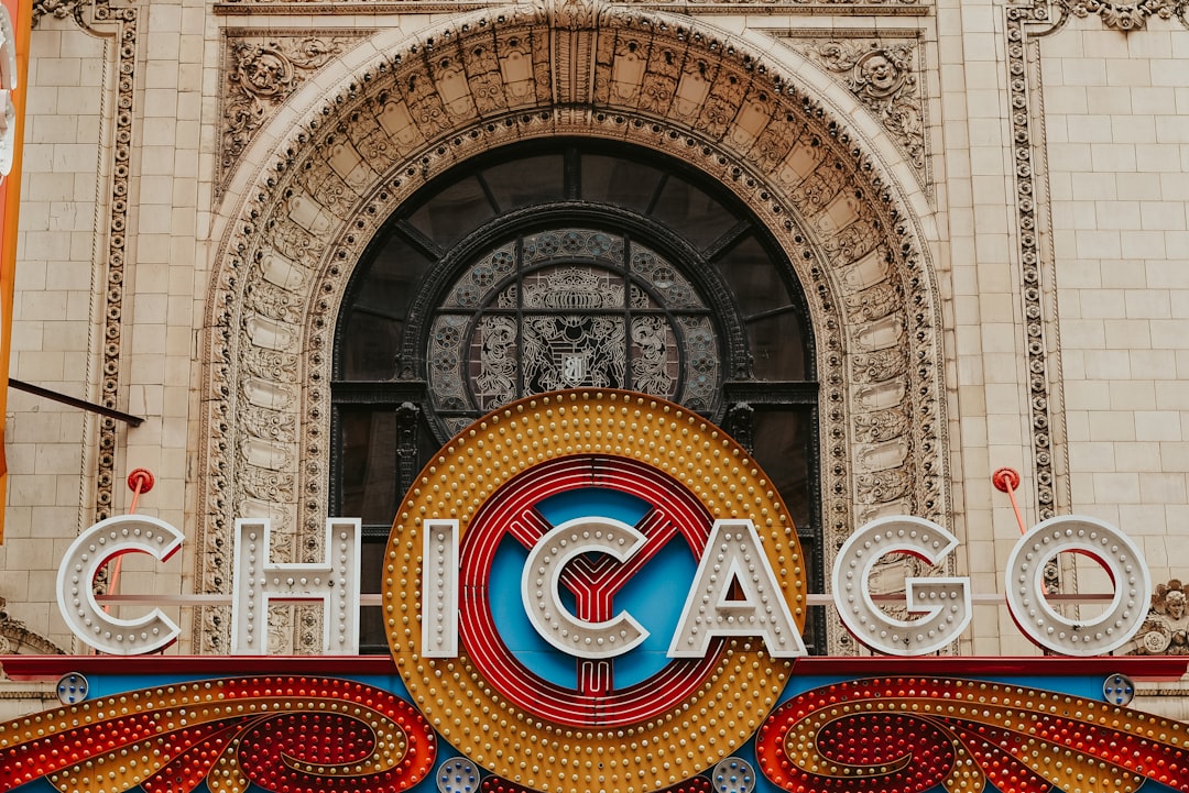 the chicago sign is displayed in front of a building,