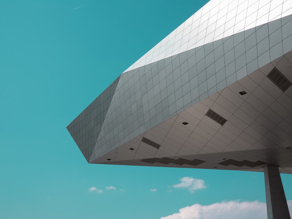 white and black concrete building under blue sky during daytime