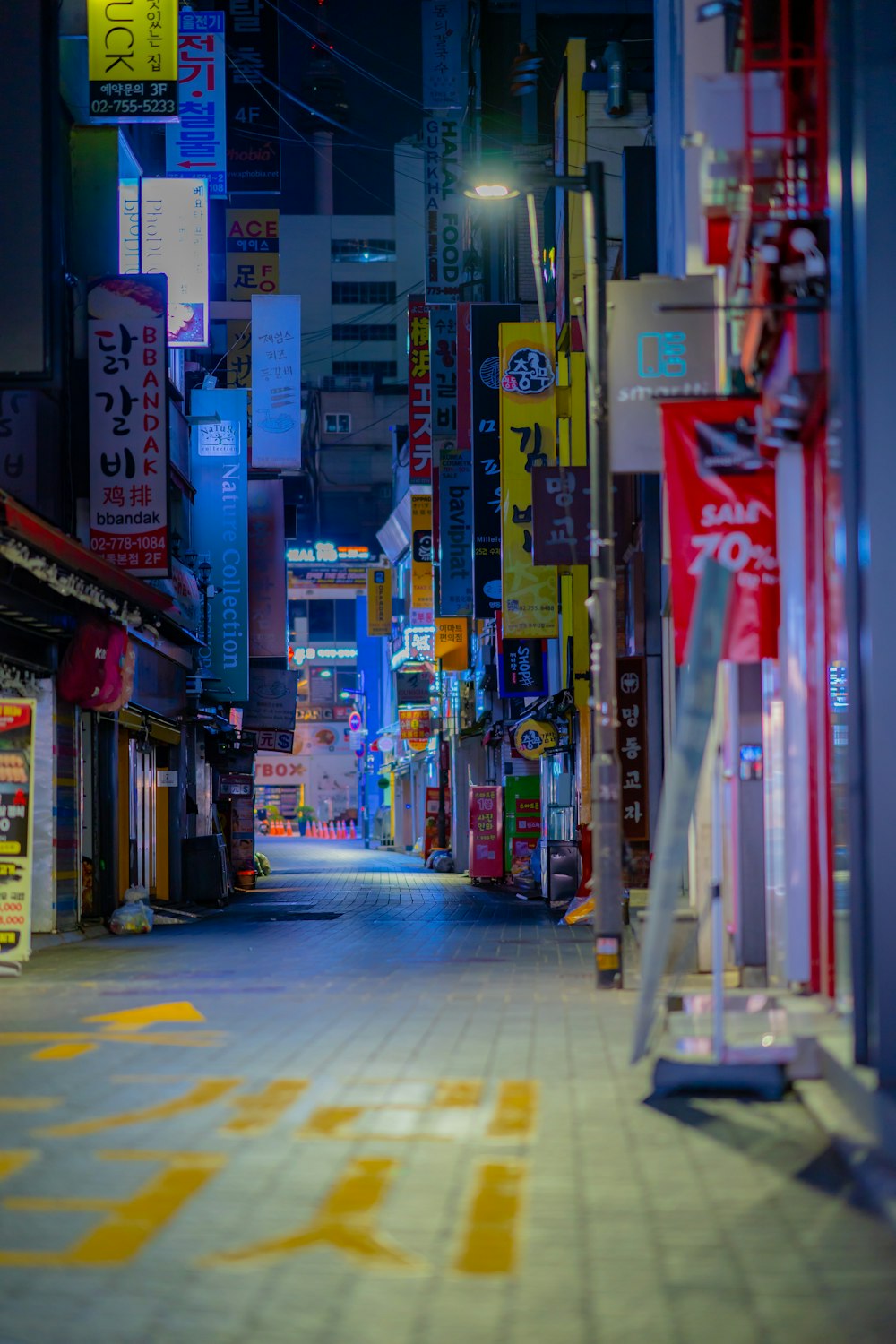 people walking on street during night time