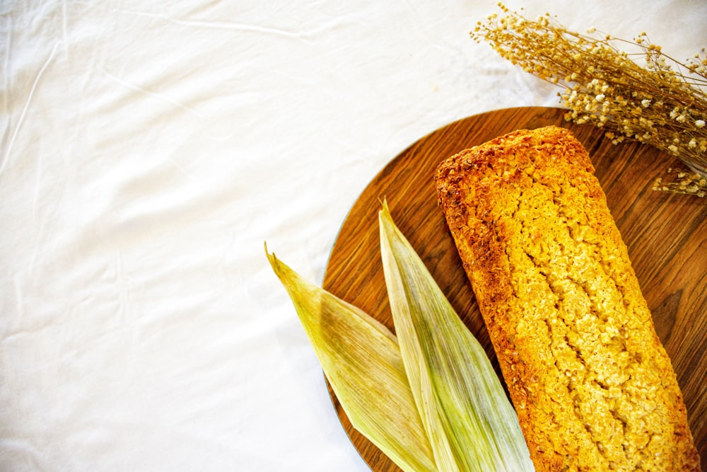 brown bread on brown wooden plate