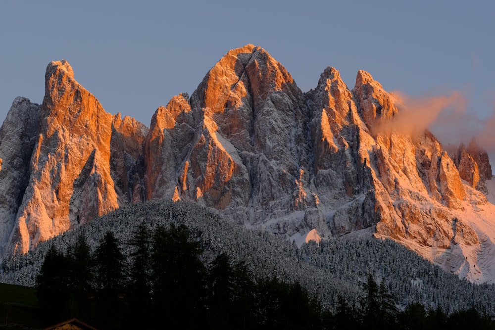 brown rocky mountain under blue sky during daytime