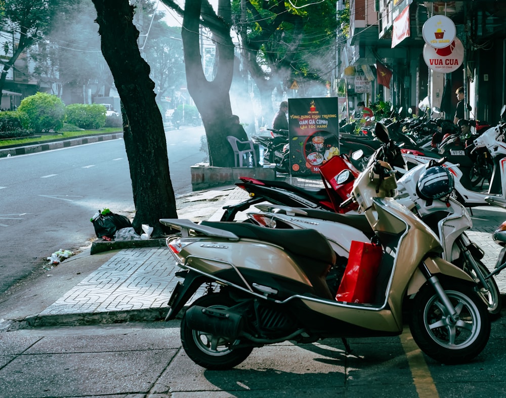 red and black motorcycle parked on sidewalk during daytime