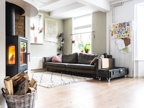 black and white sofa near brown woven basket
